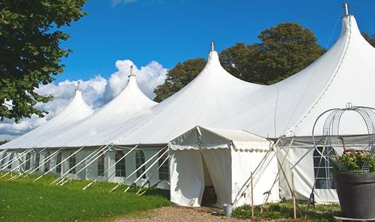 high-quality portable restrooms stationed at a wedding, meeting the needs of guests throughout the outdoor reception in Norwalk